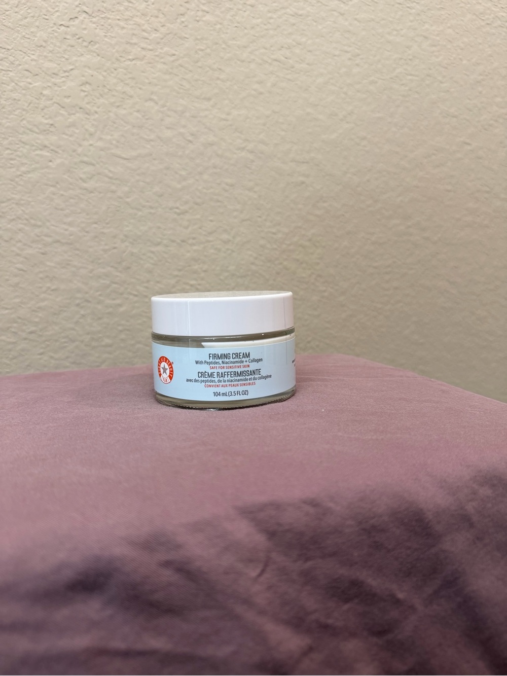 First Aid Beauty Firming Cream in White and Pink